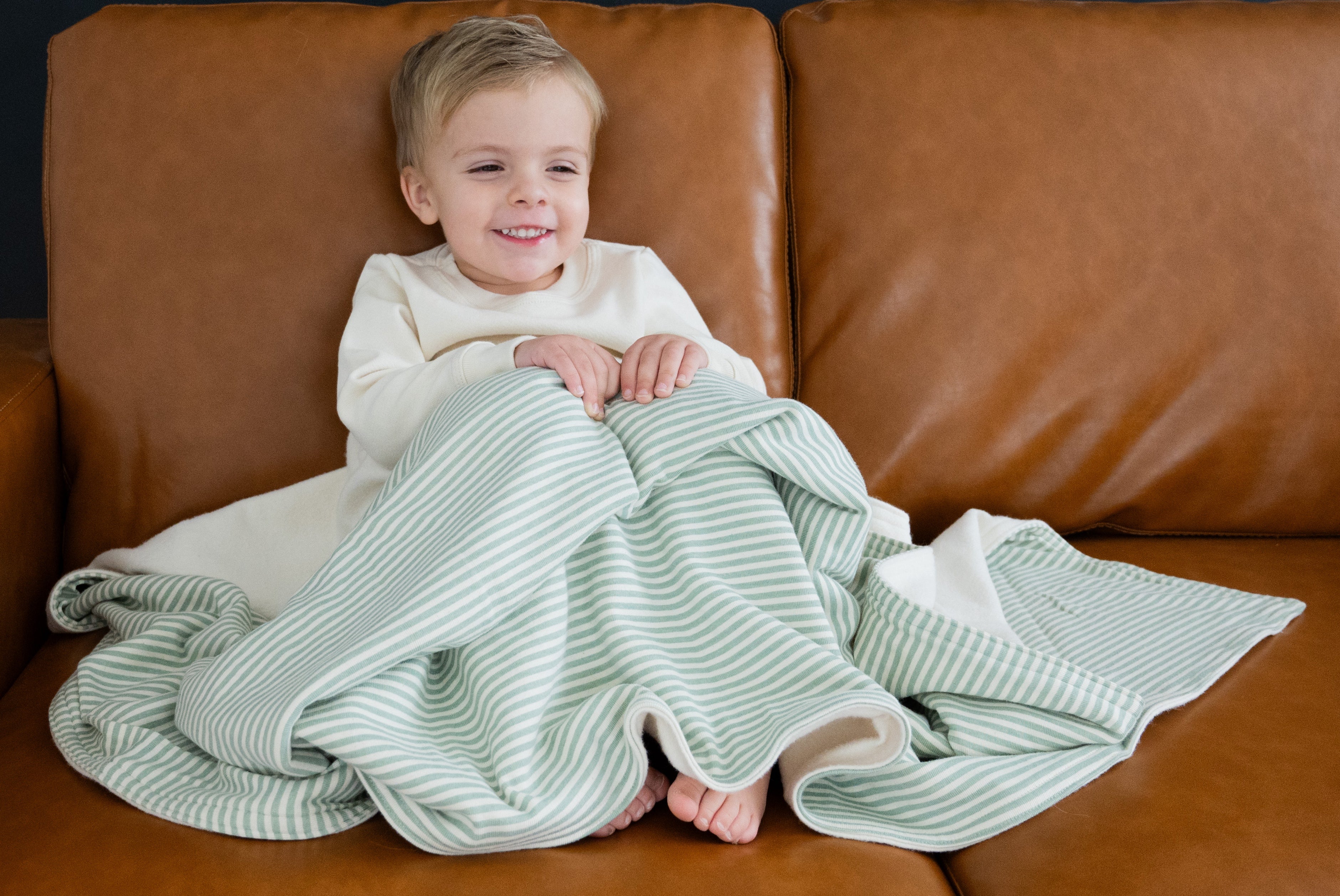 Organic Cotton Fleece Toddler Blanket TOG 3.0 Toddler Blanket CastleWare Baby Striped_Blanket_Browncouch_1f413ce4-e80d-43c5-9f51-174943b9fa0b